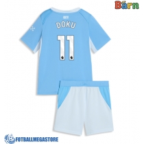 Fotballdrakt Barn Manchester City Jeremy Doku #11 Hjemmedraktsett 2026-27 Kortermet (+ Korte bukser)